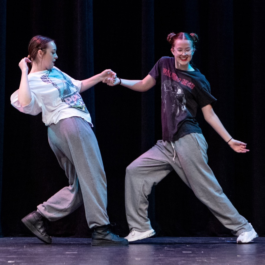 Two women doing hip hop dance.